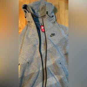 Nike full zip womens sweater. Size XS. Brand new with tags